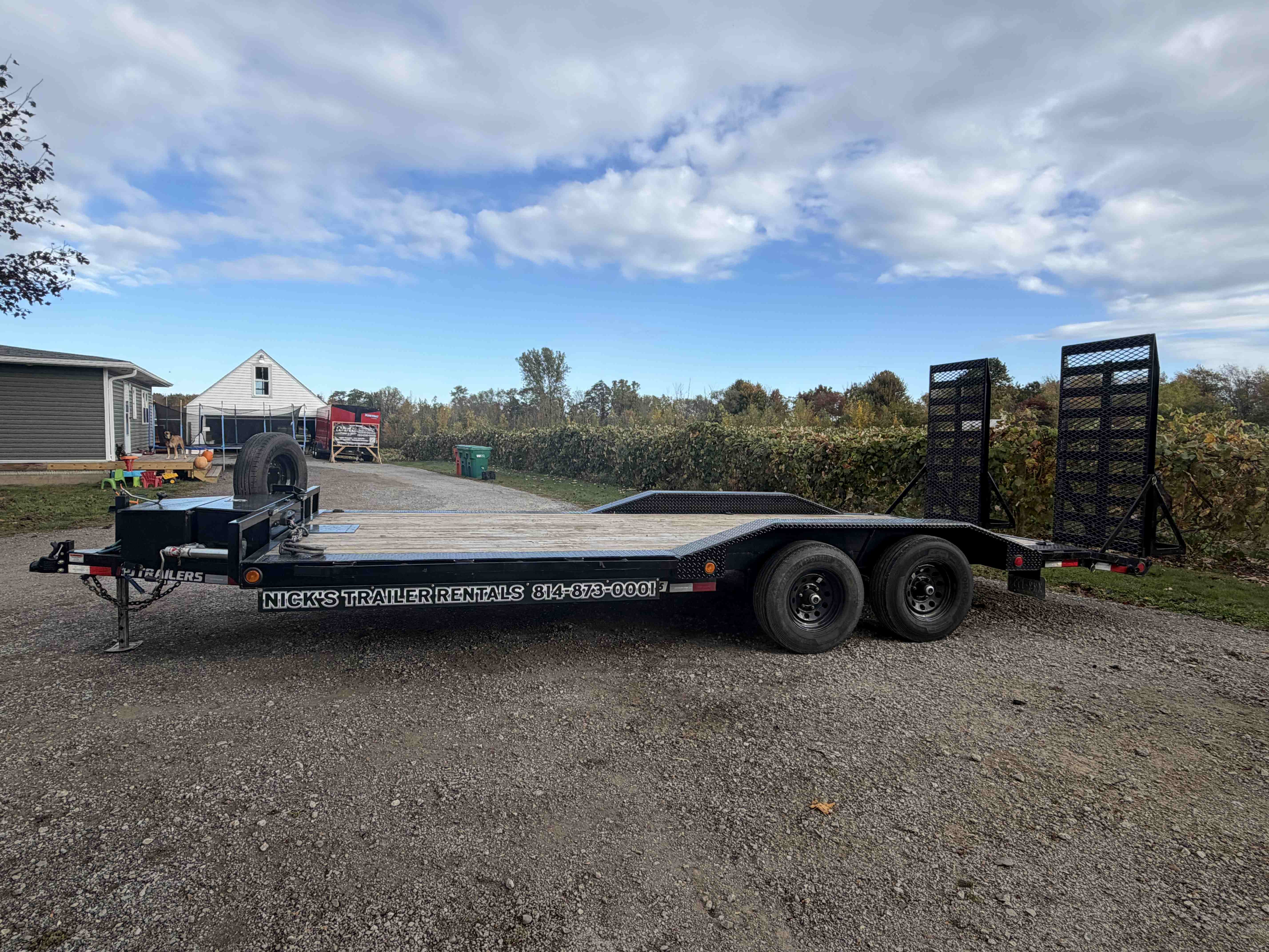 Car hauler trailer rental Erie PA - Flatbed car hauler for vehicle transport